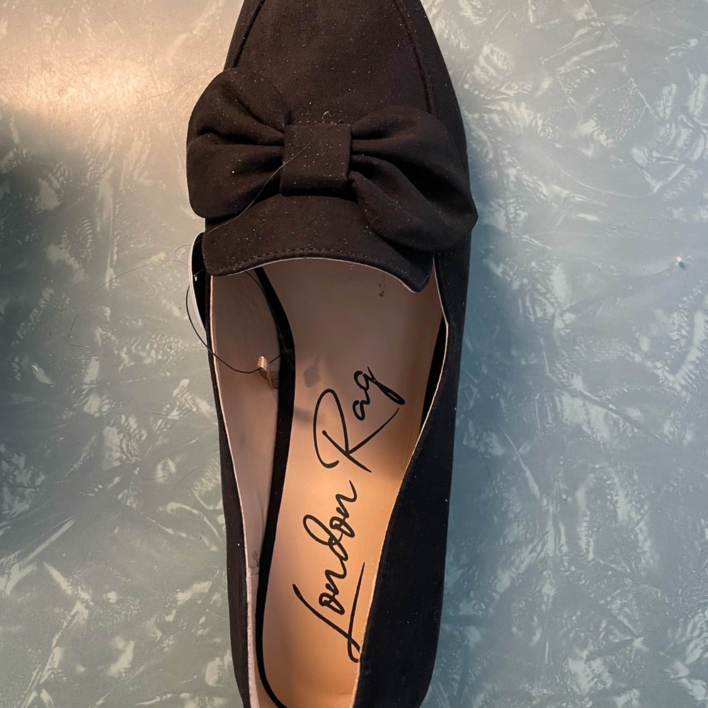 Elegant Black Bow Flats for Versatile Occasions